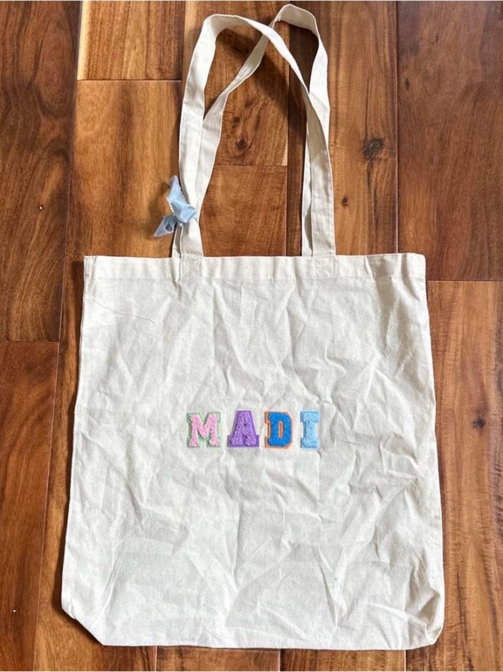 Personalized Cream Canvas Tote Bag with Colorful 'MADI' Letters